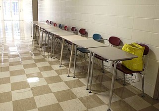 Desks sit in an elementary school hallway in Hope. (NWA Democrat-Gazette/FILE PHOTO)